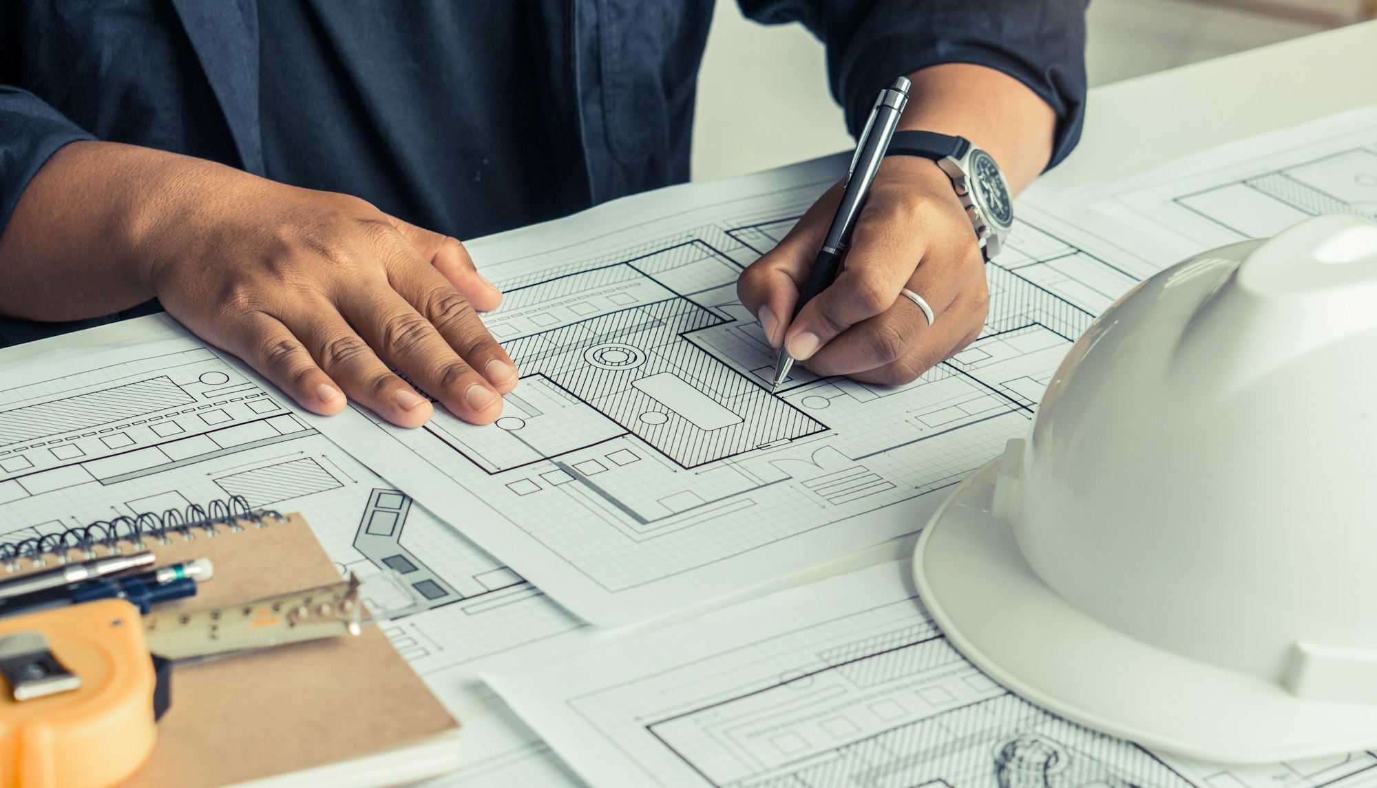 Engineer and Architect concept, Engineer Architects working with blueprints.
